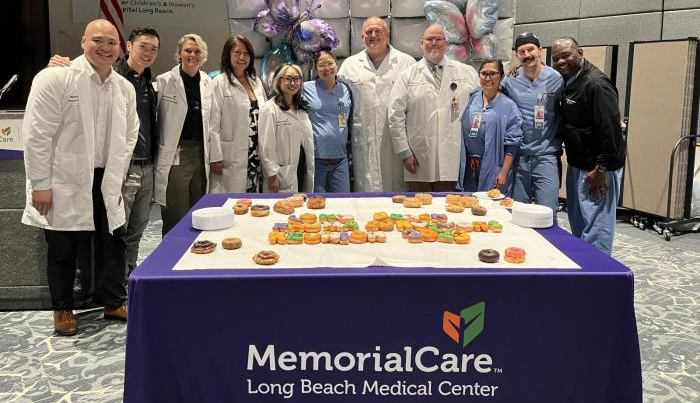Trauma care team at MemorialCare Long Beach Medical Center and Miller Children’s & Women’s Hospital gather during the Trauma Survivors Reunion, celebrating the collaborative care and dedication that helped save lives.
