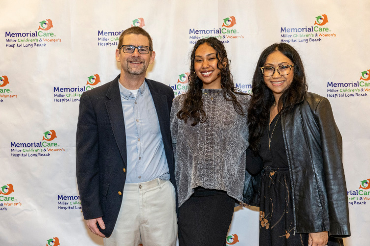 Dr. Christopher Babbitt, medical director of the Pediatric Intensive Care Unit (PICU) at Miller Children’s & Women’s Hospital, poses for picture with PICU Grateful Patient Rhyann Diaz, age 19, and Rosanna Diaz, mother, at the Virginia Country Club in Long Beach. 