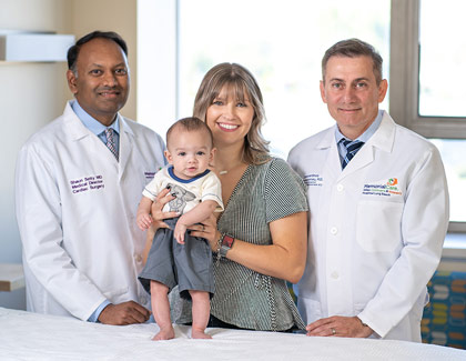 Hilary Wheeler & Hudson with Dr. Shawn Setty and Dr. Constantinos Chrysostomou